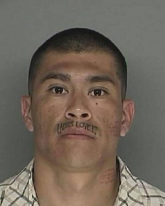Lip Serviced is listed (or ranked) 13 on the list The Most Out-Of-Control Face Tattoos Captured By The Mugshot Camera