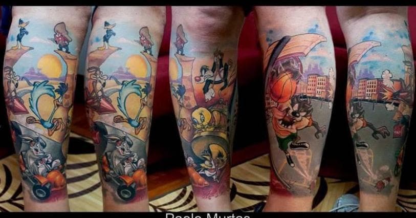 Louis Vuitton and Marvel mashup tattoo on the forearm.