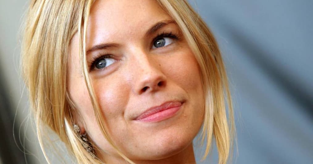 She's Just Like A Woman! Sienna Miller bares her chest in just a