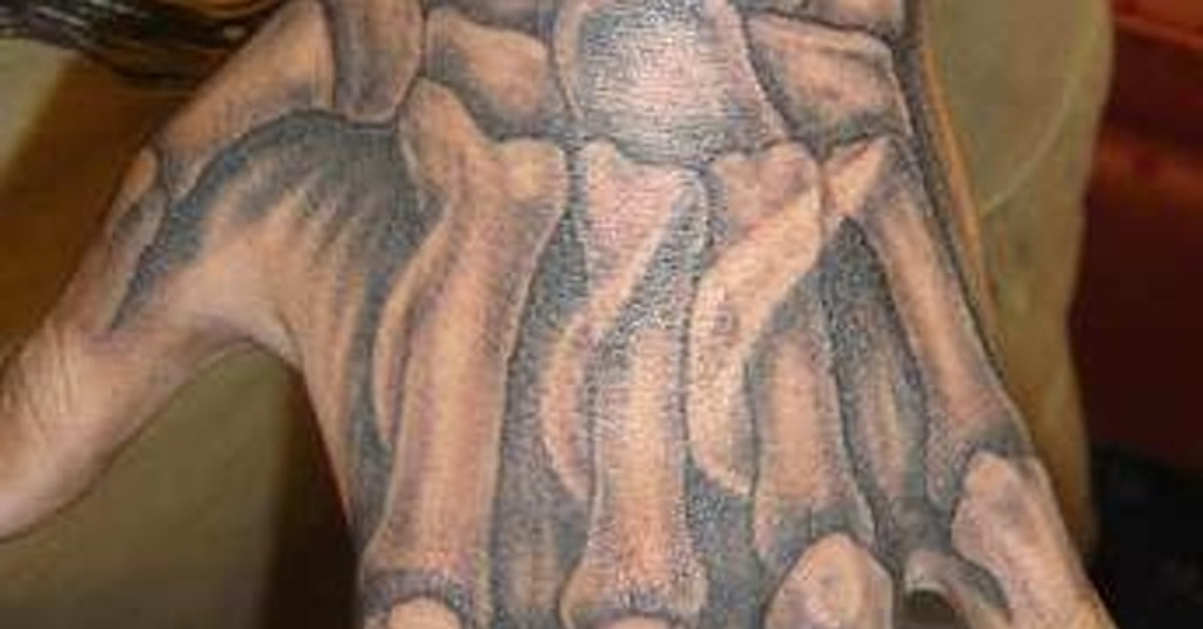 hand tattoos for men tribal
