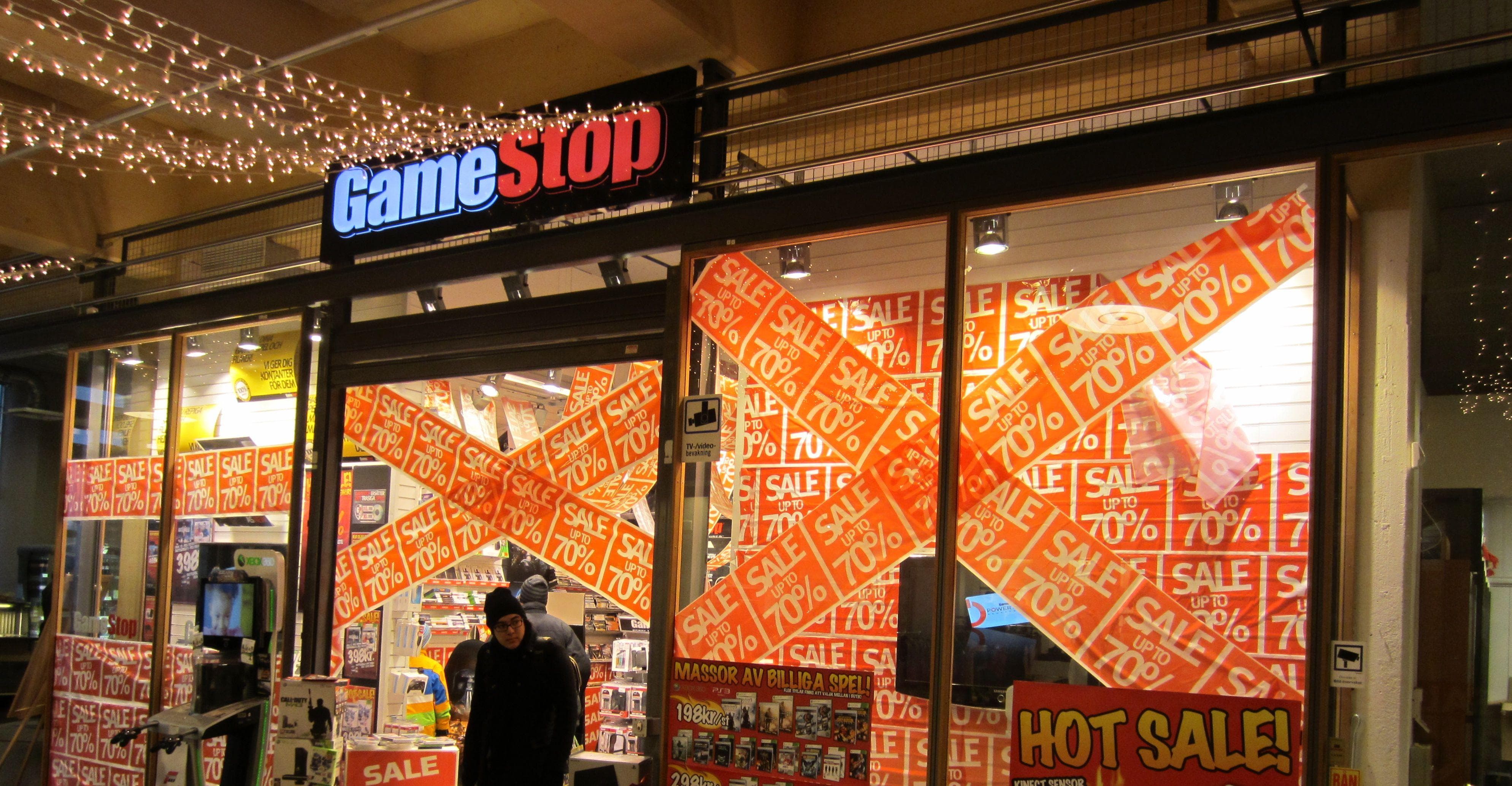 gamestop selling used games as new