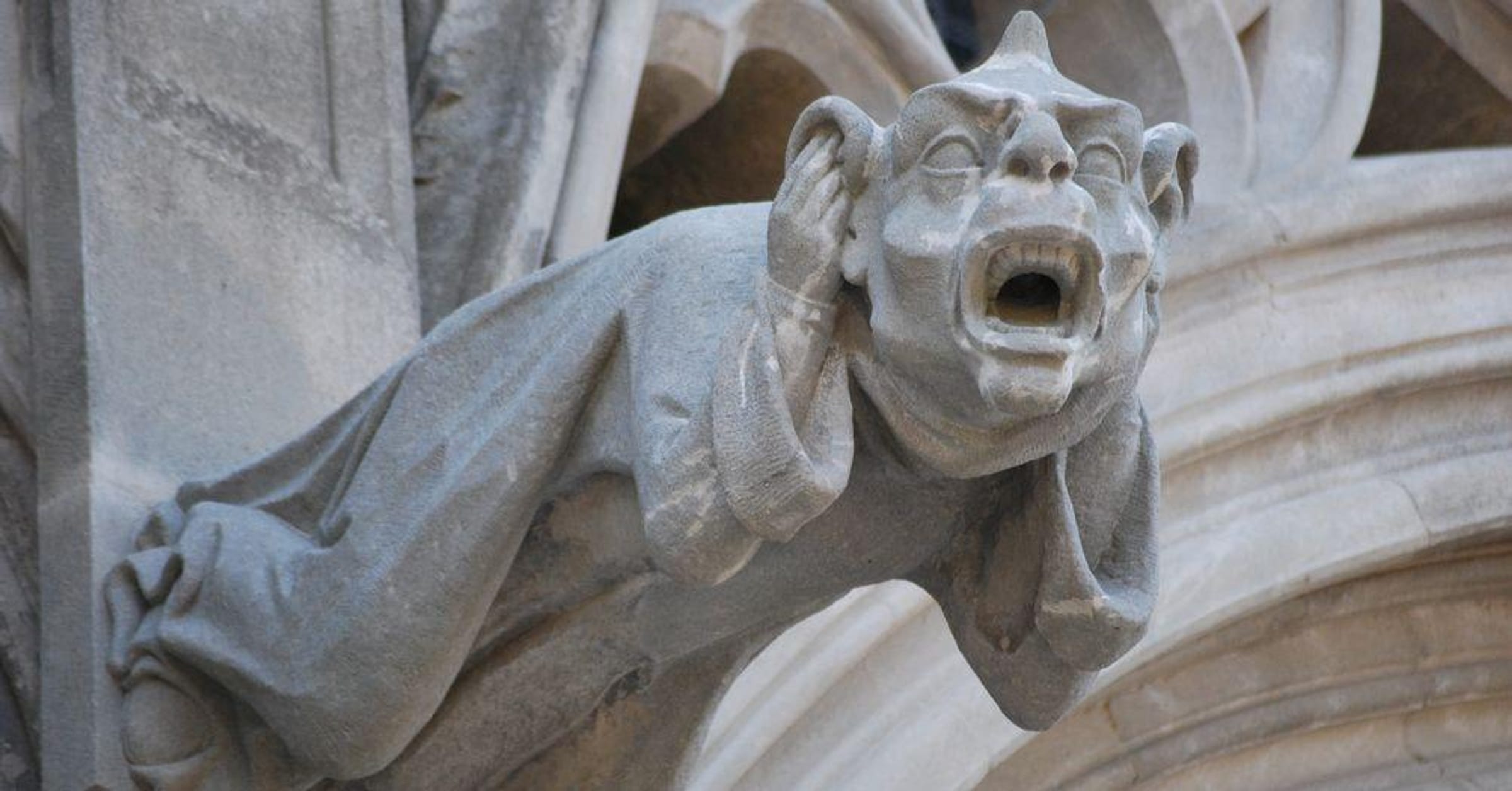 Bizarre story behind 600-year-old statue of gargoyle giving