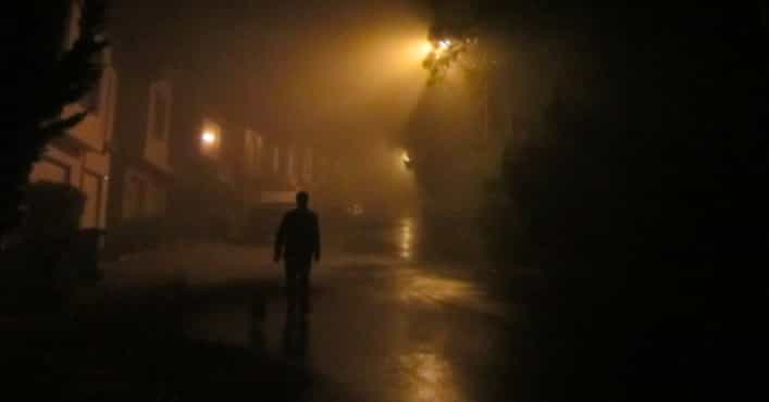 people walking at night