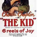 Charlie Chaplin, Lita Grey, Jackie Coogan   The Kid is a 1921 American silent comedy-drama film written by, produced by, directed by and starring Charlie Chaplin, and features Jackie Coogan as his adopted son and sidekick.