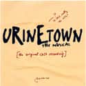 Mark Hollmann , Greg Kotis   Urinetown: The Musical is a satirical comedy musical from 2001, with music by Mark Hollmann, lyrics by Hollmann and Greg Kotis, and book by Kotis.