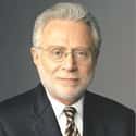 age 70   Wolf Isaac Blitzer is a journalist and television news anchor, who has been a CNN reporter since 1990. He is the host of The Situation Room and the daytime show Wolf.