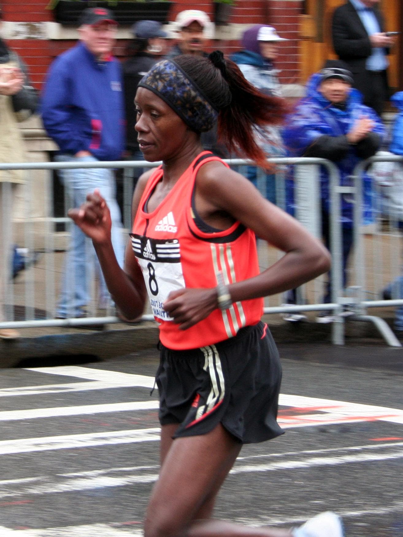 Dutch runner Hilda Kibet runs to win the women race at the