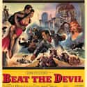 Humphrey Bogart, Gina Lollobrigida, Peter Lorre   Beat the Devil is a 1953 film directed by John Huston.