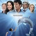 Morgan Freeman, Ashley Judd, Kris Kristofferson   Dolphin Tale is a 2011 family drama film directed by Charles Martin Smith from a screenplay by Karen Janszen and Noam Dromi and a book of the same name.
