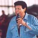 Rock music, Rock and roll   Chubby Checker is an American singer-songwriter. He is widely known for popularizing the twist dance style, with his 1960 hit cover of Hank Ballard's R&B hit "The Twist".