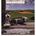 Gene Hackman, Dennis Hopper, Barbara Hershey   Hoosiers is a 1986 sports film written by Angelo Pizzo and directed by David Anspaugh.