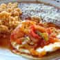 Huevos rancheros is listed (or ranked) 18 on the list The Best Food For A Hangover