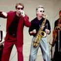 Doo-wop, Blues-rock, Blue-eyed soul   Huey Lewis and the News is an American pop rock band based in San Francisco, California.