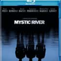 Emmy Rossum, Sean Penn, Kevin Bacon   Mystic River is a 2003 American mystery drama film directed and scored by Clint Eastwood.