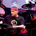 Progressive metal, Swing music, Heavy metal   Neil Ellwood Peart, OC, is a Canadian musician and author. He is the drummer and lyricist for the rock band Rush.