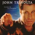 John Travolta, Robert Duvall, Kyra Sedgwick   Phenomenon is a 1996 American romantic fantasy drama film directed by Jon Turteltaub, written by Gerald Di Pego, and starring John Travolta, Kyra Sedgwick, Forest Whitaker, Robert Duvall, and...