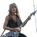 Glam metal, Heavy metal, Neo-classical metal   Randall William "Randy" Rhoads was an American heavy metal guitarist who played with Ozzy Osbourne.