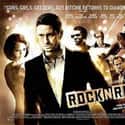 Gemma Arterton, Gerard Butler, Tom Hardy   RocknRolla is a 2008 British comedy film written and directed by Guy Ritchie, and starring Gerard Butler, Tom Wilkinson, Thandie Newton, Mark Strong, Idris Elba, Tom Hardy, Jimi Mistry and Toby...