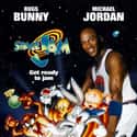 Michael Jordan, Bill Murray, Larry Bird   Space Jam is a 1996 American live-action/animated sports family/comedy film starring basketball player Michael Jordan and featuring the Looney Tunes characters.