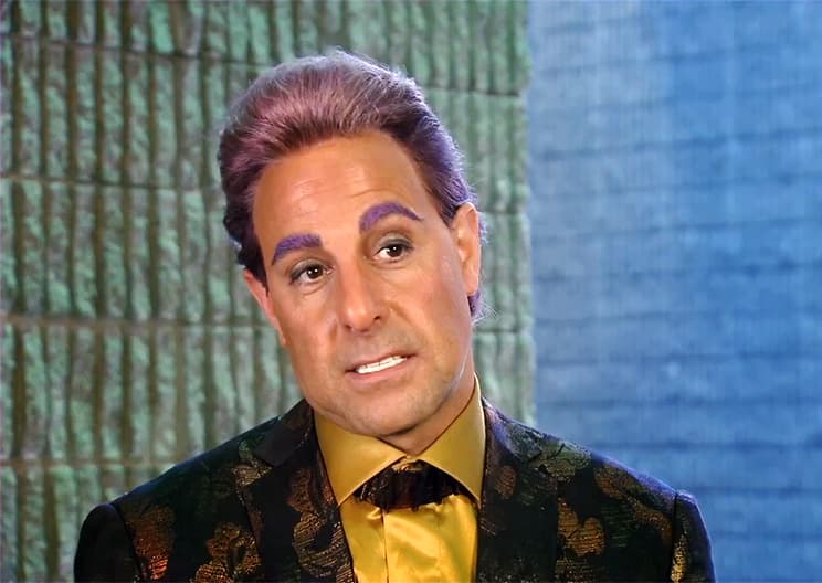 Caesar Flickerman in the Movies: Extravagant, Yet Understated