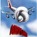 Kareem Abdul-Jabbar, Leslie Nielsen, Ethel Merman   Airplane! is a 1980 American satirical disaster comedy film directed and written by David Zucker, Jim Abrahams, and Jerry Zucker and released by Paramount Pictures.