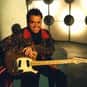 Andrew Farriss is listed (or ranked) 10 on the list Famous Rhythm Guitarists
