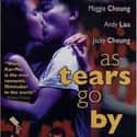 Maggie Cheung, Andy Lau, Jacky Cheung Hok-yau   As Tears Go By is a 1988 Hong Kong action drama film that was the directorial debut of Wong Kar-wai that starred Andy Lau, Maggie Cheung and Jacky Cheung.