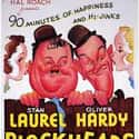 Stan Laurel, Oliver Hardy, Billy Gilbert   Block-Heads is a 1938 comedy film starring Stan Laurel and Oliver Hardy, produced by Hal Roach Studios for Metro-Goldwyn-Mayer.