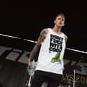 Black Flag, Lace Up, Half Naked & Almost Famous   Richard Colson Baker, better known by his stage name Machine Gun Kelly, is an American rapper from Cleveland, Ohio, signed to Bad Boy and Interscope Records.