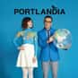 Fred Armisen, Carrie Brownstein, Kyle MacLachlan   Portlandia is a satirical sketch comedy television series, set and filmed in and around Portland, Oregon; it stars Carrie Brownstein and former Saturday Night Live cast member Fred Armisen.