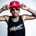 Up & Away, My Own Lane, Hero   Brian Todd Collins, best known by his stage name Kid Ink, is an American rapper, singer, songwriter and former record producer.
