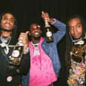 Young Rich N*ggas, Versace, No Label 2   Migos is an American hip hop group based in Atlanta, Georgia. The group consists of Quavo, Takeoff, and Offset.