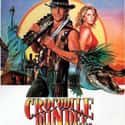 Paul Hogan, Linda Kozlowski, Reginald VelJohnson   Crocodile Dundee is a 1986 Australian comedy film set in the Australian Outback and in New York City. It stars Paul Hogan as the weathered Mick Dundee.