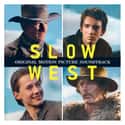 Michael Fassbender, Kodi Smit-McPhee, Ben Mendelsohn   Slow West is a 2014 action thriller western film written by John Maclean and directed by John Maclean.