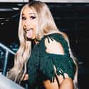 Hip hop, Trap   Belcalis Almanzar (born October 11, 1992), known professionally as Cardi B, is an American rapper, singer, songwriter, and media personality.