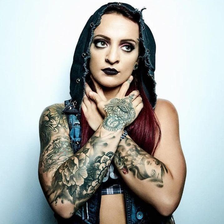 The WWE Wrestlers With Fiery Red Hair That Blazed Their Way To Stardom