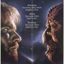 Dennis Quaid, Louis Gossett, Jr.   Enemy Mine is a 1985 science fiction drama film directed by Wolfgang Petersen based on the story of the same name by Barry B. Longyear.