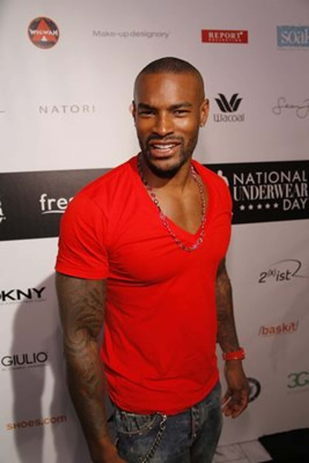 Tyson Beckford in Red V-Neck T-Shirt with Slim Jeans