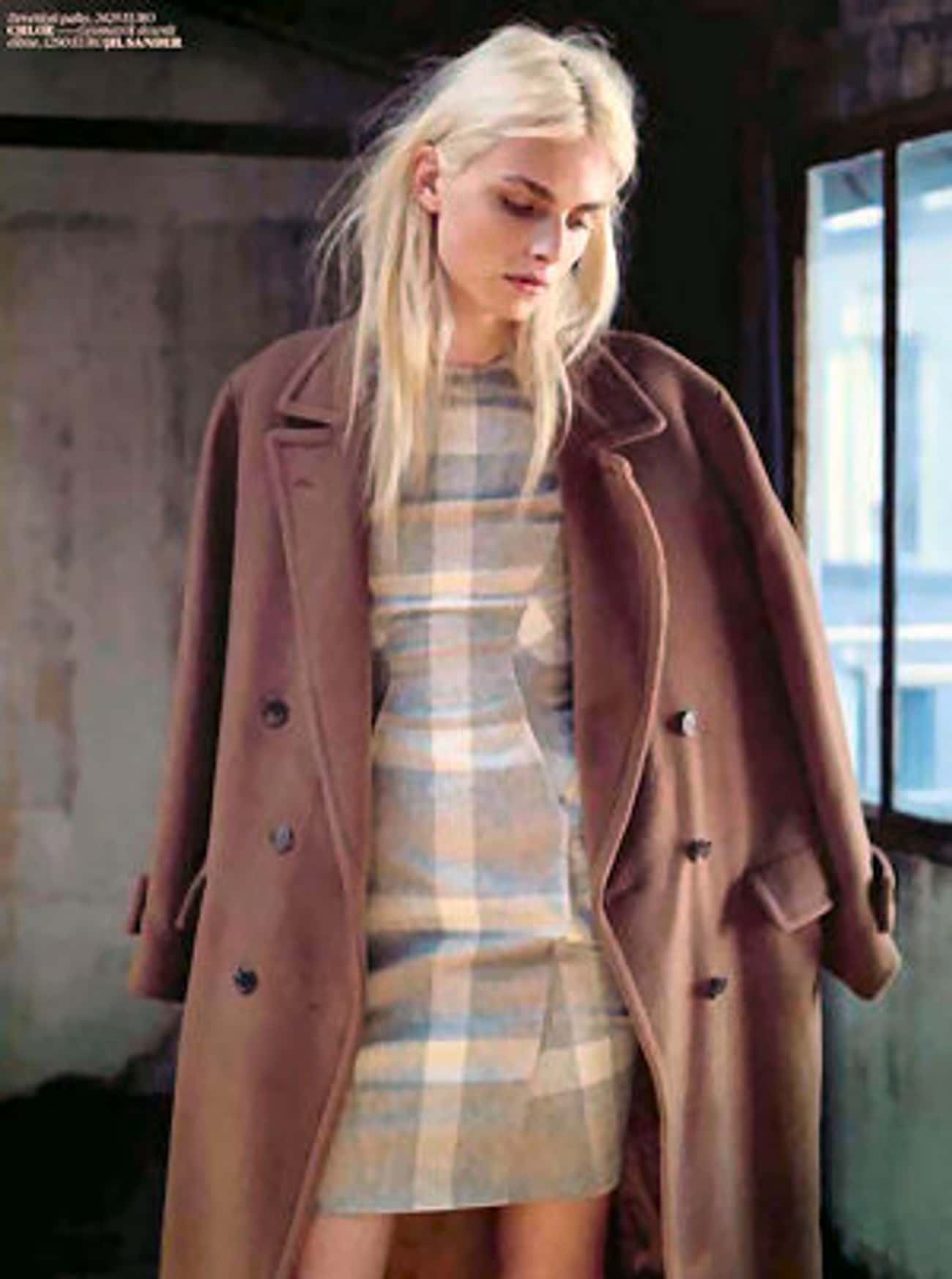 Andrej Pejic in Trench Coat with Checkered Pencil Dress Insert