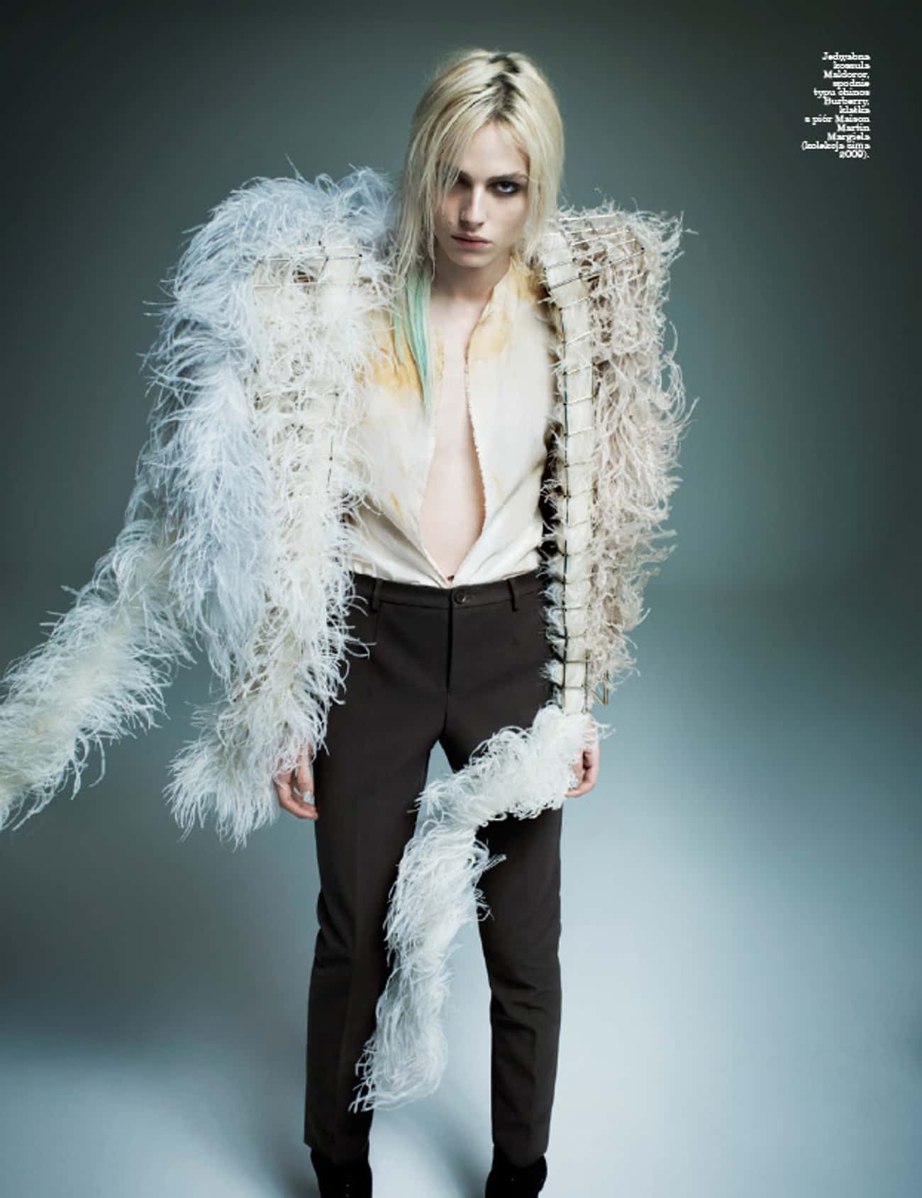 Andrej Pejic in Detailed Feather Jacket with Open Long Sleeve