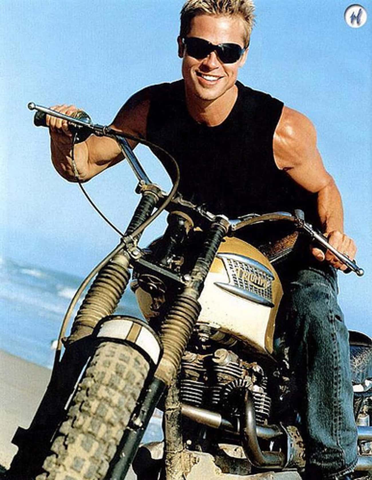 Brad Pitt Proves He Can Get Even Manlier and Sexier By Adding A Motorcycle