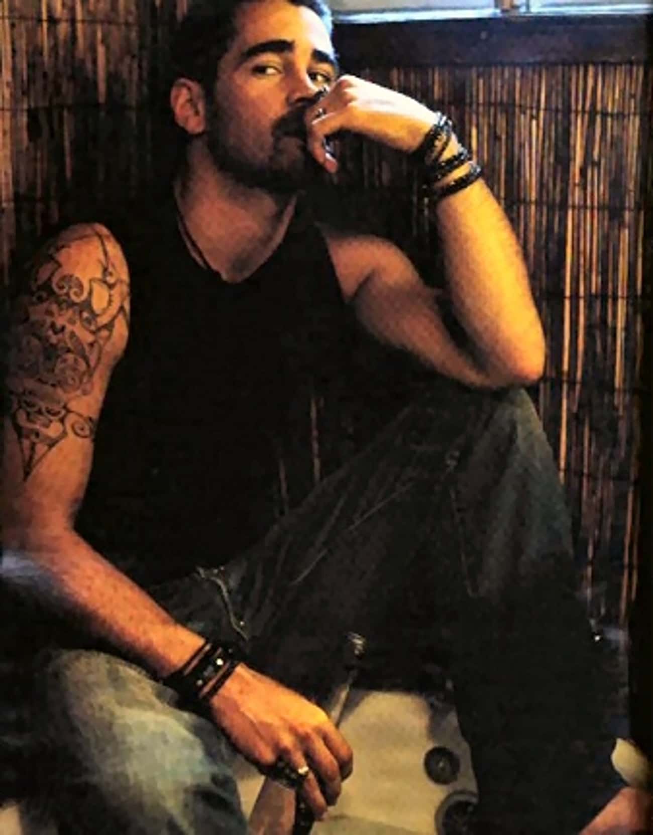Colin Farrell in Sleeveless Shirt with Indigo Jeans