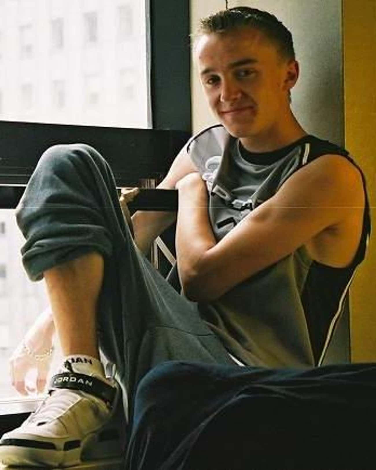 Tom Felton in Sports Double Vest with Loose Jeans