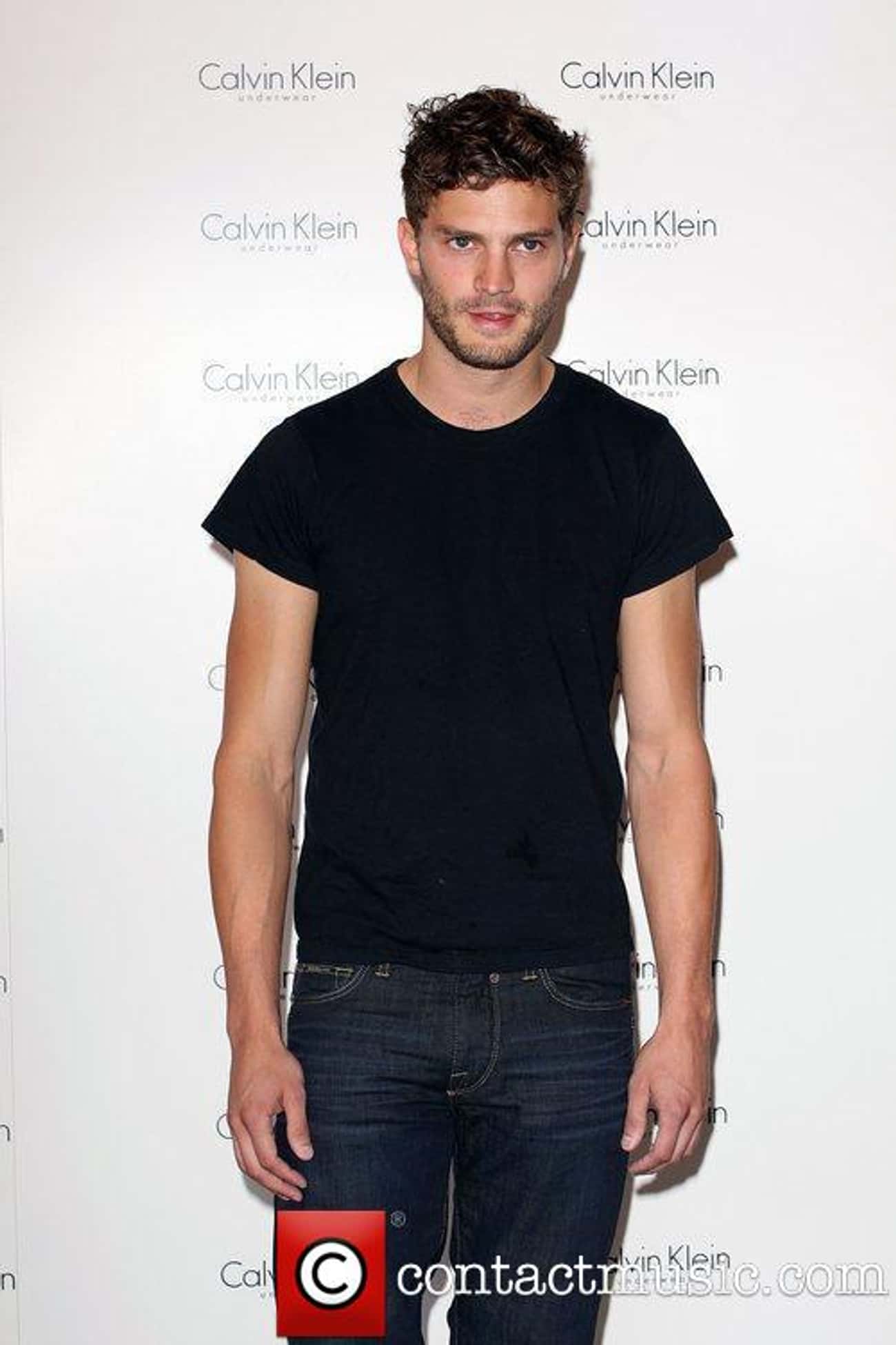 Jamie Dornan in Crew Neck T-Shirt with Wash Stone Jeans