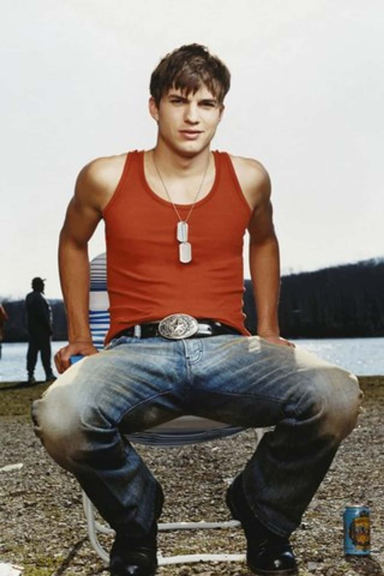Ashton Kutcher in Red Vest with Tapered Jeans