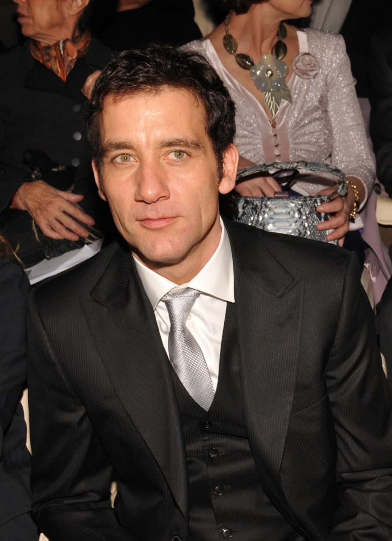 Clive Owen in Black Vested Tuxedo and Gray Tie
