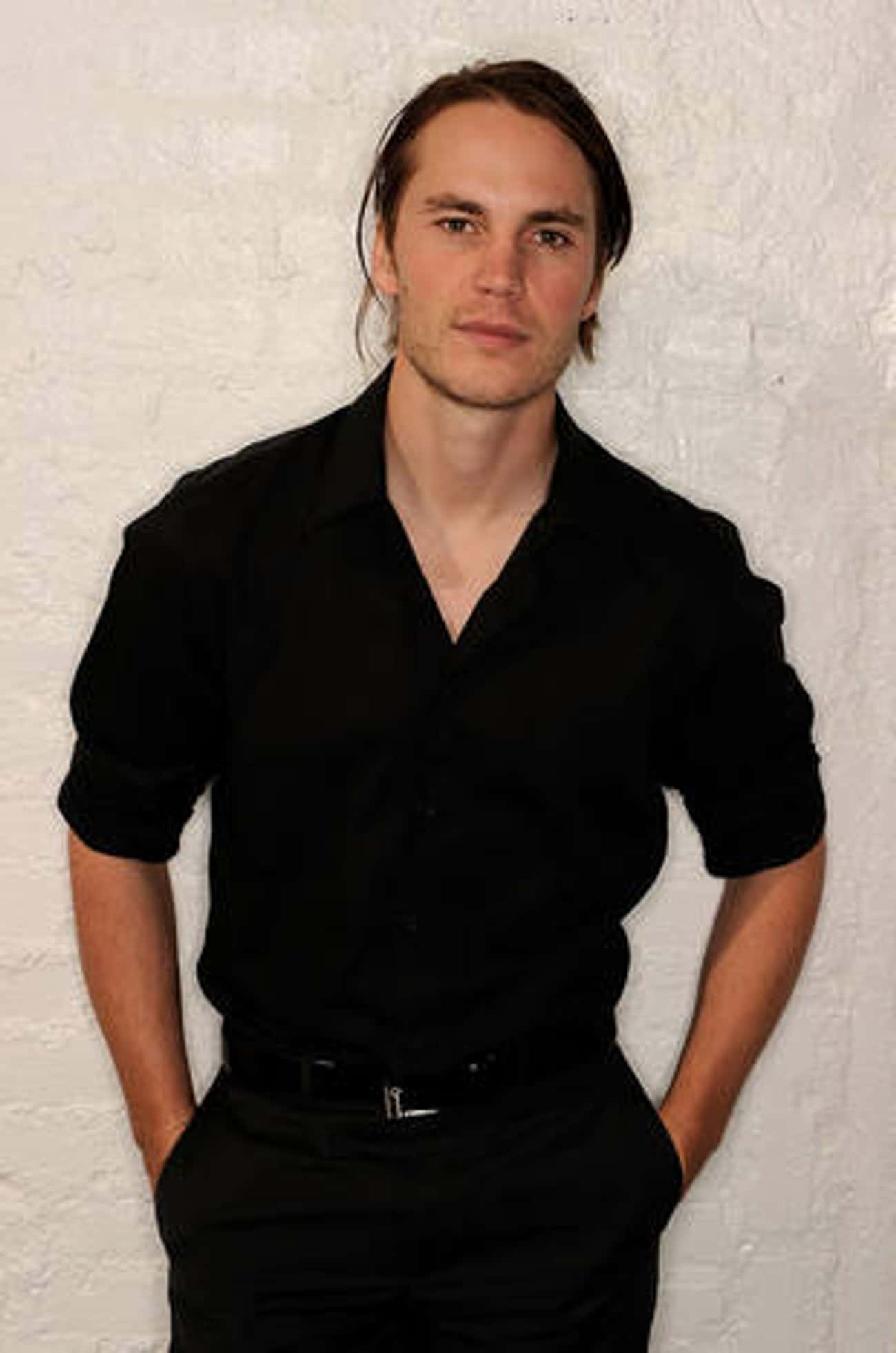 Taylor Kitsch in Black Polo with Slacks