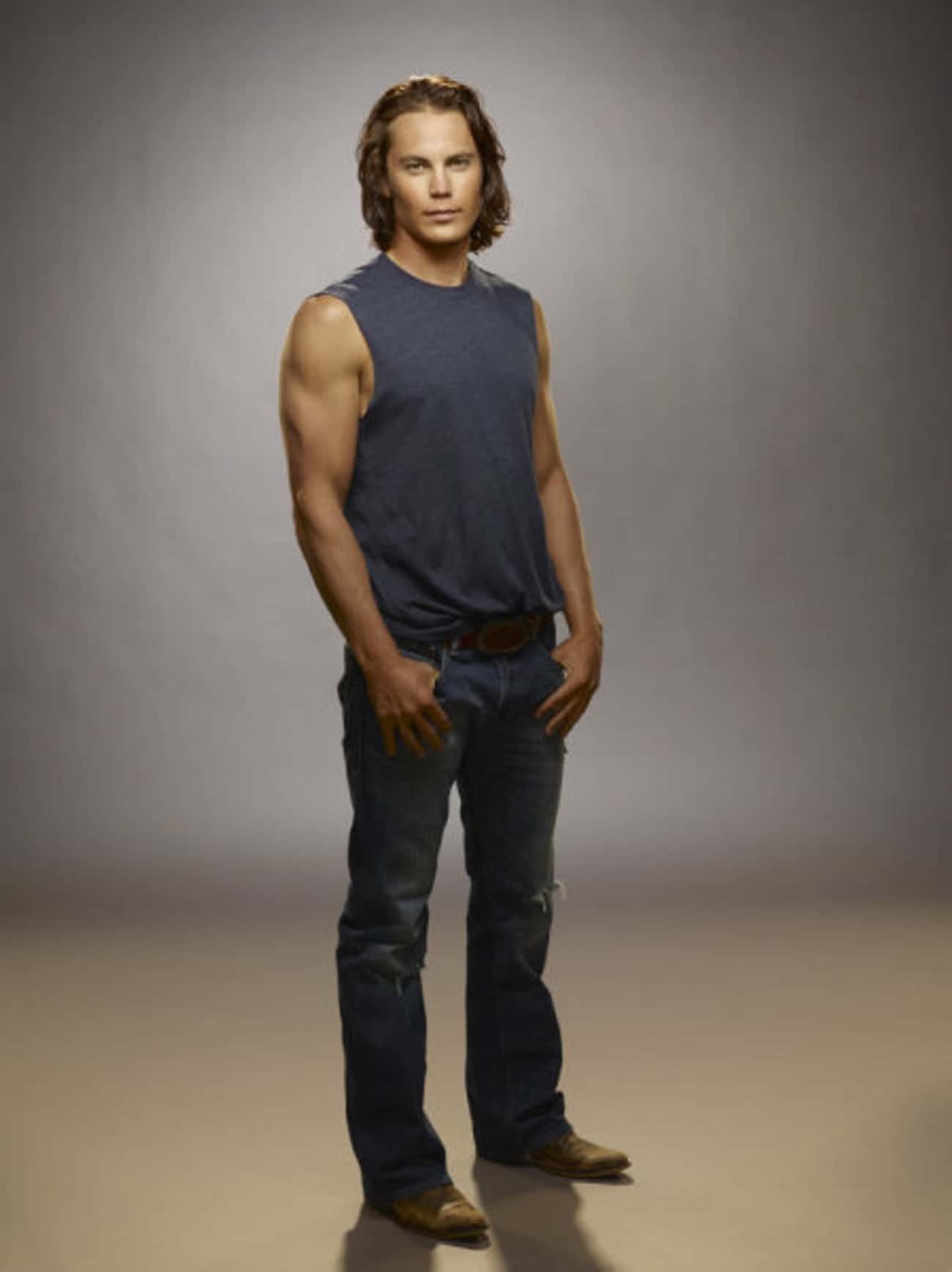 Taylor Kitsch in Gray Vest with Slim Fit Jeans