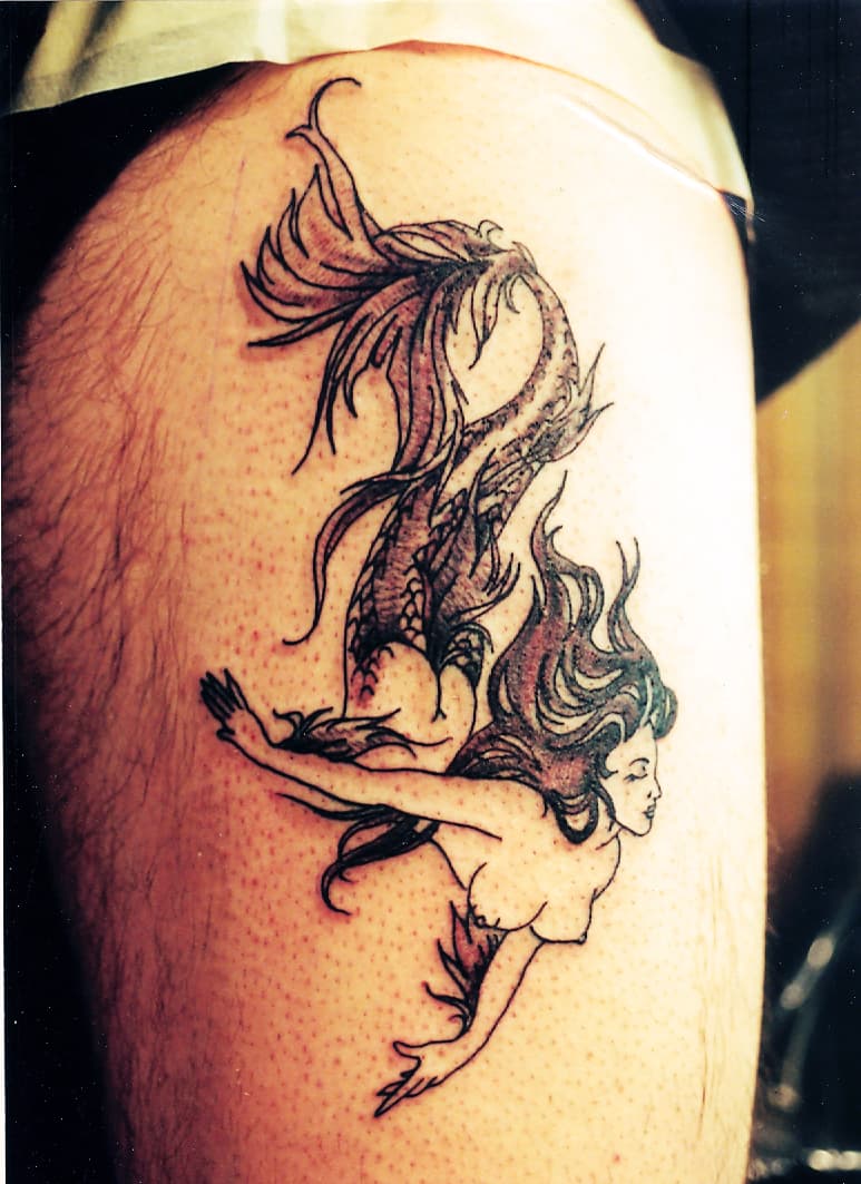 Thigh Tattoos: Picture List Of Thigh Tattoo Designs