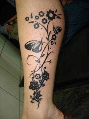 tree tattoos on lower leg